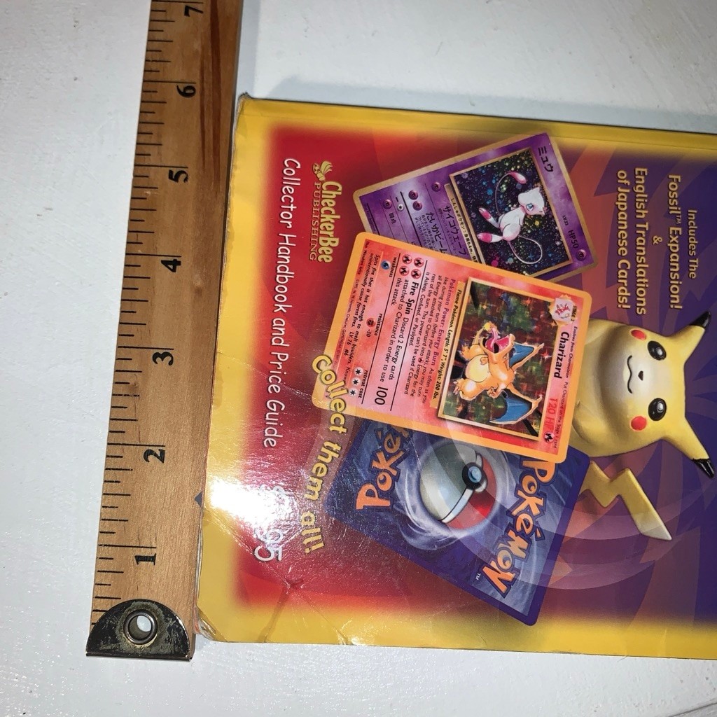 Unbranded Pokemon Collector&rsquo;s Value Guide One Size Yellow Purple